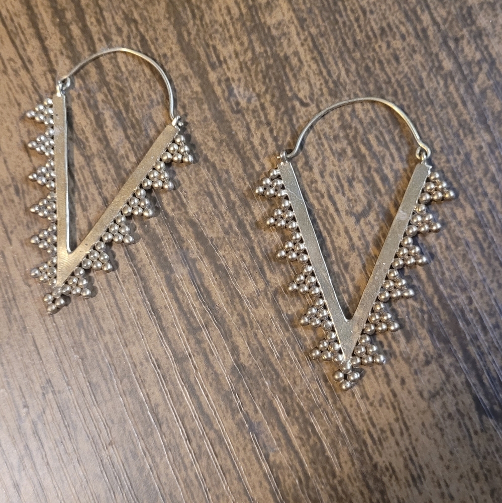 Gold V shaped earrings